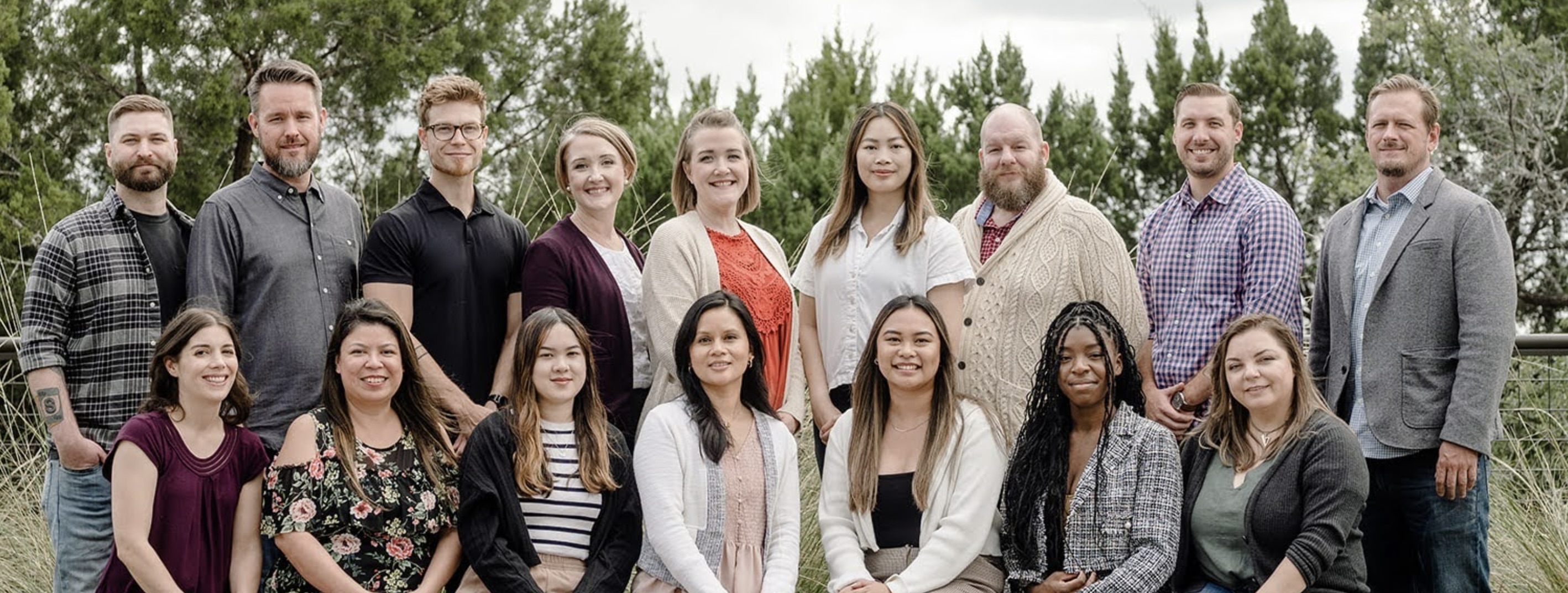 The Slide UX team, photographed together outdoors